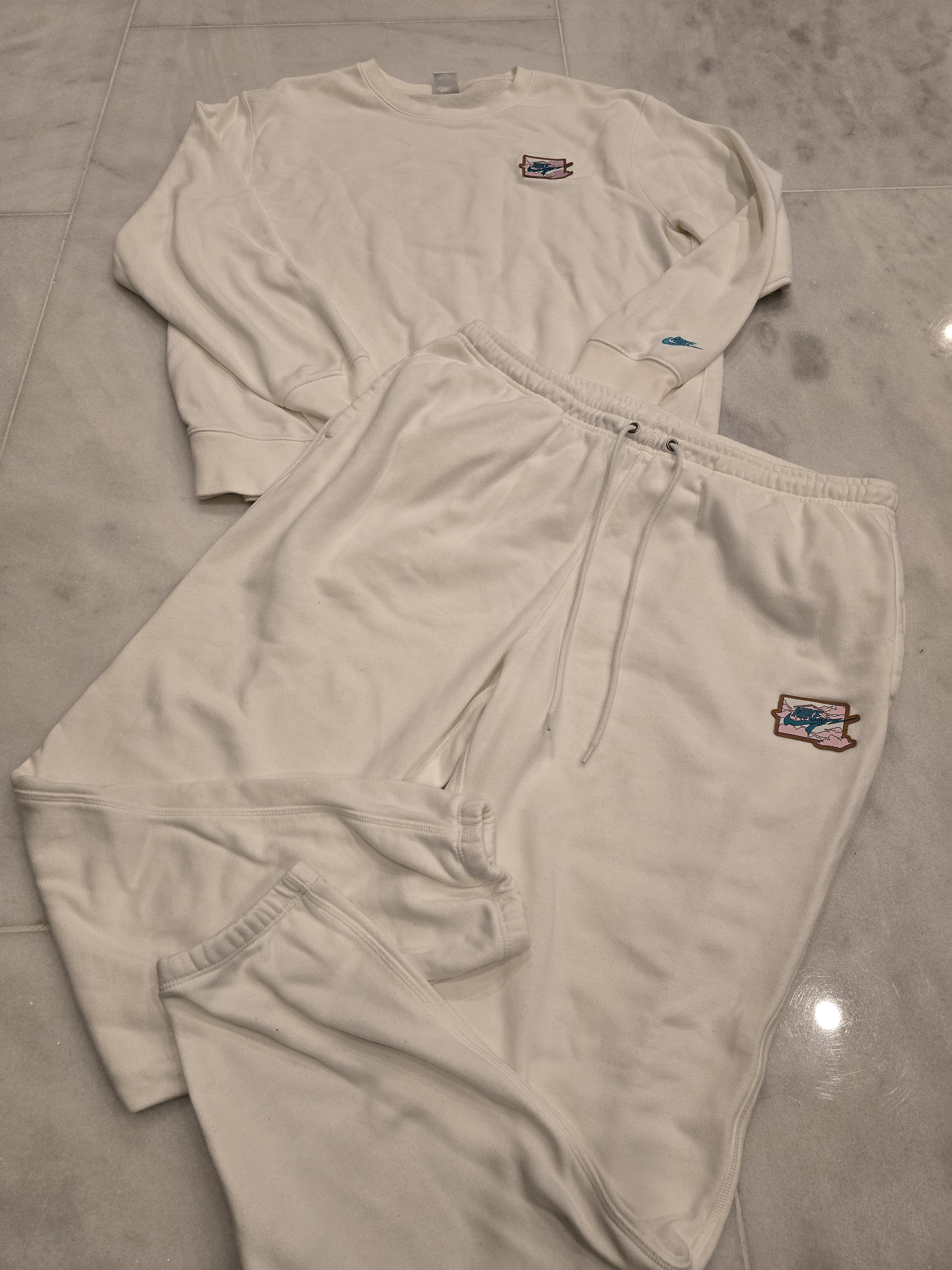 White Two-Piece Crewneck Sweatshirt And Joggers Set With Embroidered Patch